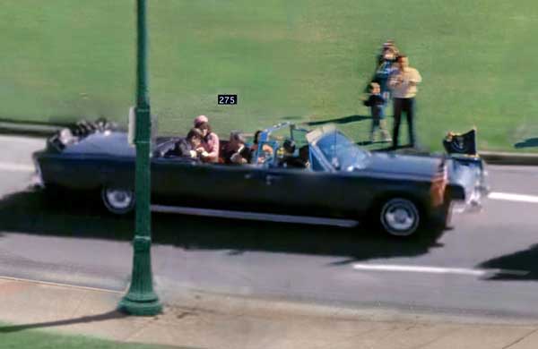 John F. Kennedy JFK assassination Mrs. Kennedy attends to the president.