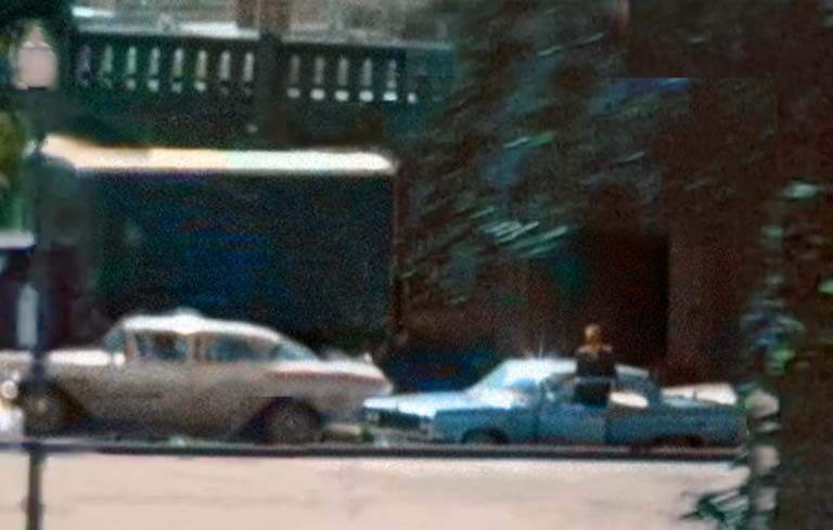 John F. Kennedy JFK assassination, John Dolan stops his car and gets out to view the presidential motorcade.